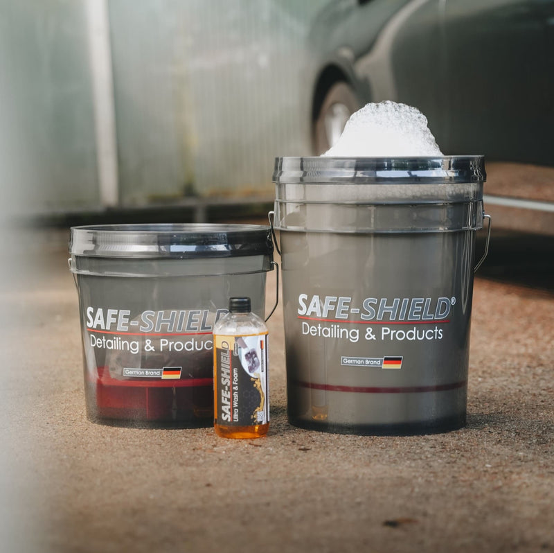 Two Safe-Shield wash buckets in different sizes beside Wash & Foam Shampoo