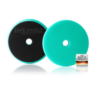 Green Safe-Shield Max Cut polishing pad showing the polishing face and hook-and-loop backing.